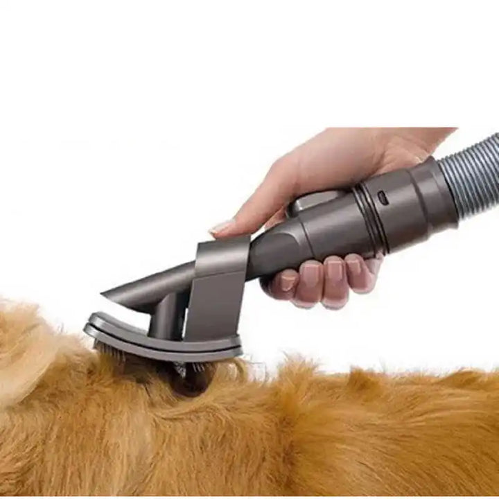 Dog brush vacuum attachment, specializing in pet grooming and collecting loose animal hair.