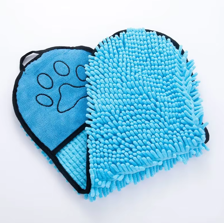 Dog enjoying quick dry with a gray microfiber pet towel and grooming glove after a swim