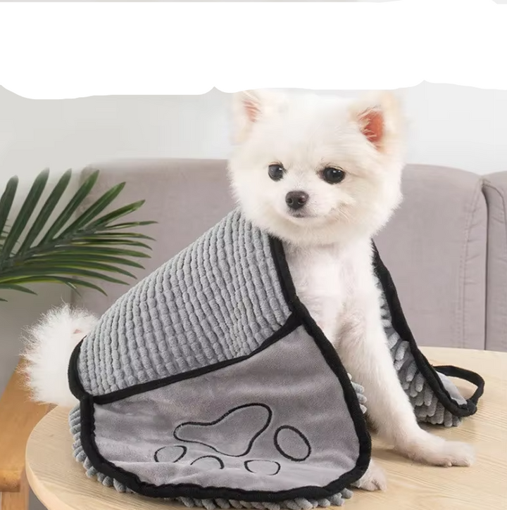 Microfiber pet towel with glove for dogs and cats laid flat, showcasing its absorbent fabric