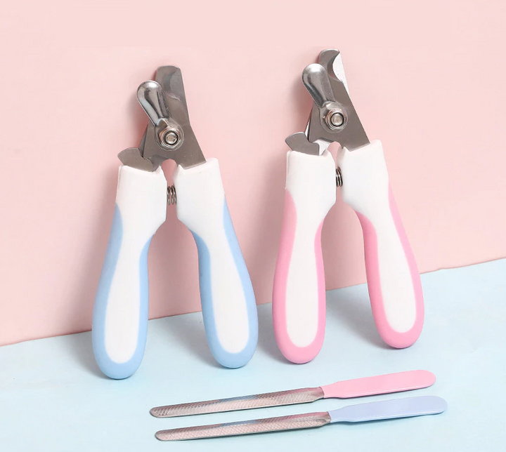 Close-up of pet nail clippers, highlighting the safety lock and integrated nail file.