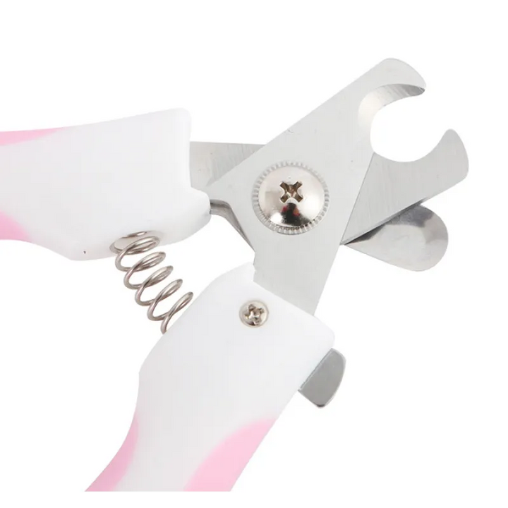Essential pet grooming kit item: nail clippers with safety lock for stress-free animal care.
