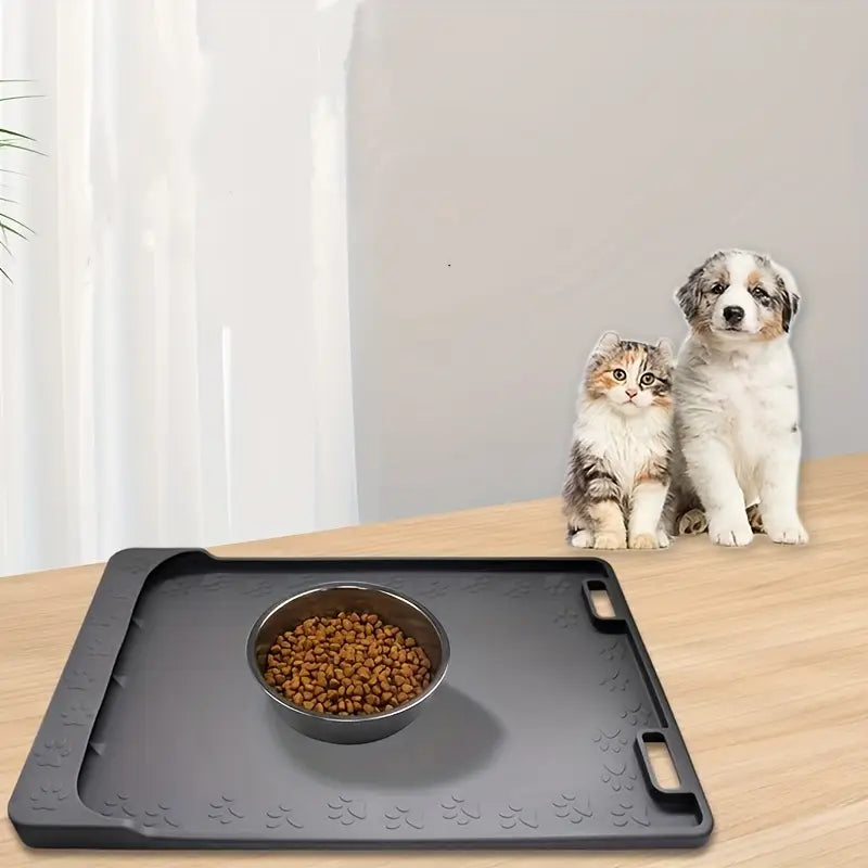 Black pet bowl mat, non-slip, designed to keep dog and cat food/water in place.