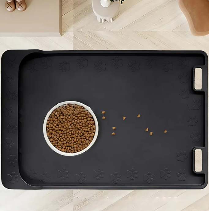 Set of two pet non-slip food and water mats, one blue, one pink, for multiple pets.