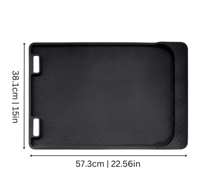 Pet non-slip food mat under a dog bowl, illustrating its spill-proof functionality.