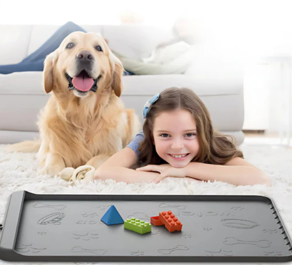 Packaging shot of a non-slip pet mat, highlighting its easy-clean and spill-proof features.