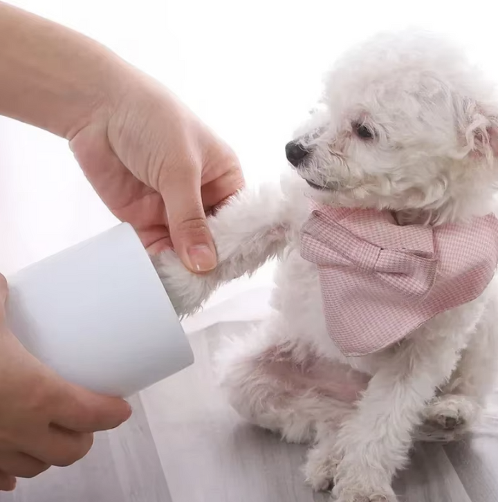 Pet paw cleaner with soft silicone brushes, perfect for dog and cat grooming and hygiene.