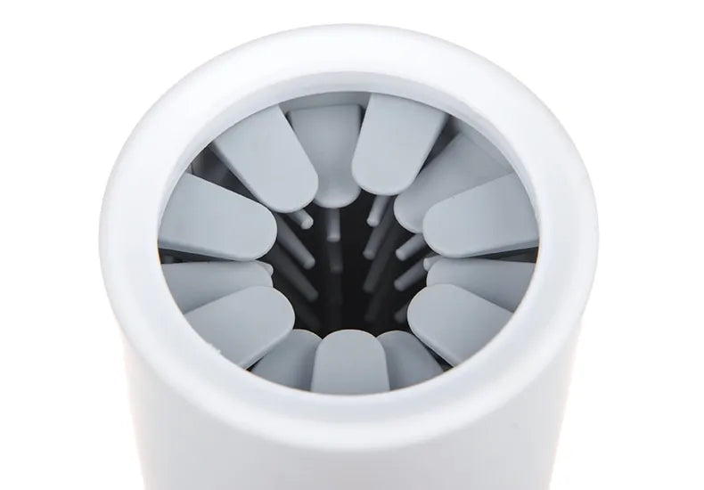 Components of a pet paw cleaner: soft silicone brushes and outer casing, for easy and portable pet care.