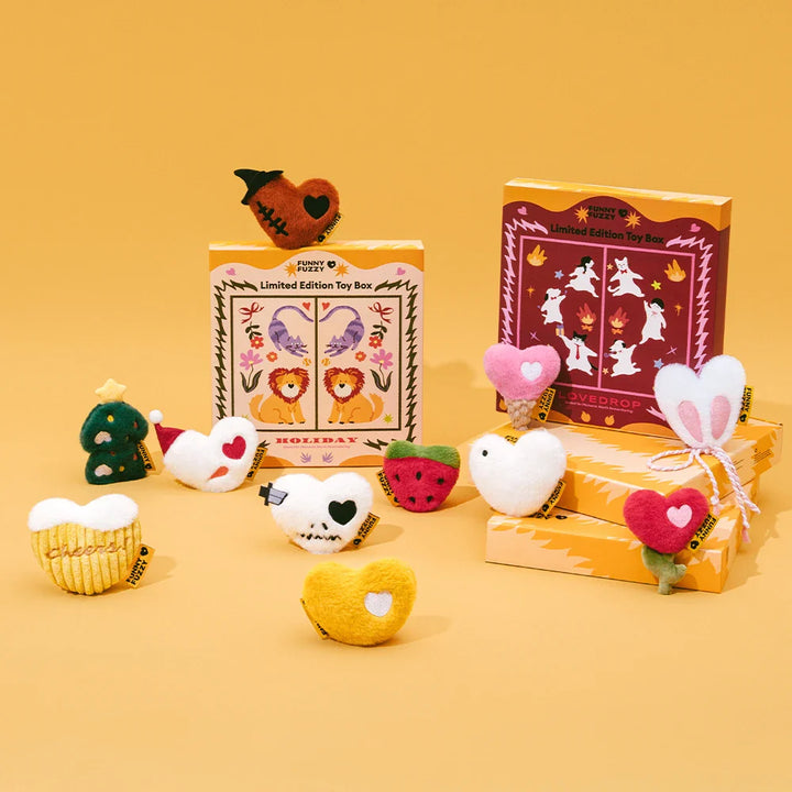 Pet Plush Squeaker Toy Box Set for dogs, soft interactive puppy toys with holiday theme.