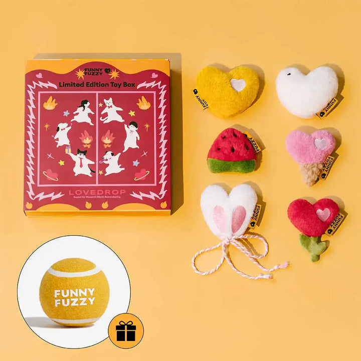 Open box showcasing adorable plush squeaker dog toys, perfect for pet gifts and interactive play.