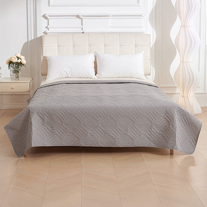 Grey Pet Proof Water-Resistant Bed Cover, folded neatly, highlighting its durable and pet-proof design.
