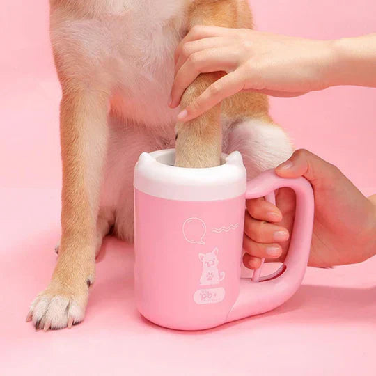 Collection of pet grooming supplies, featuring the Self-Cleaning Paw Washer Cup for dogs & cats
