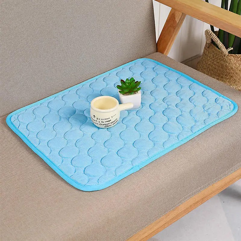 Lightweight, portable pet cooling mat rolled up, showcasing its travel-friendly design for dogs & cats
