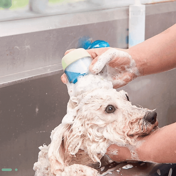 Blue pet shower brush with shampoo dispenser, ideal for dog and cat grooming supplies