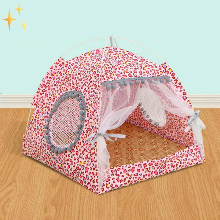 Pet tent bed with cover situated on a patio, showcasing its use as a cozy outdoor pet house for cats/dogs