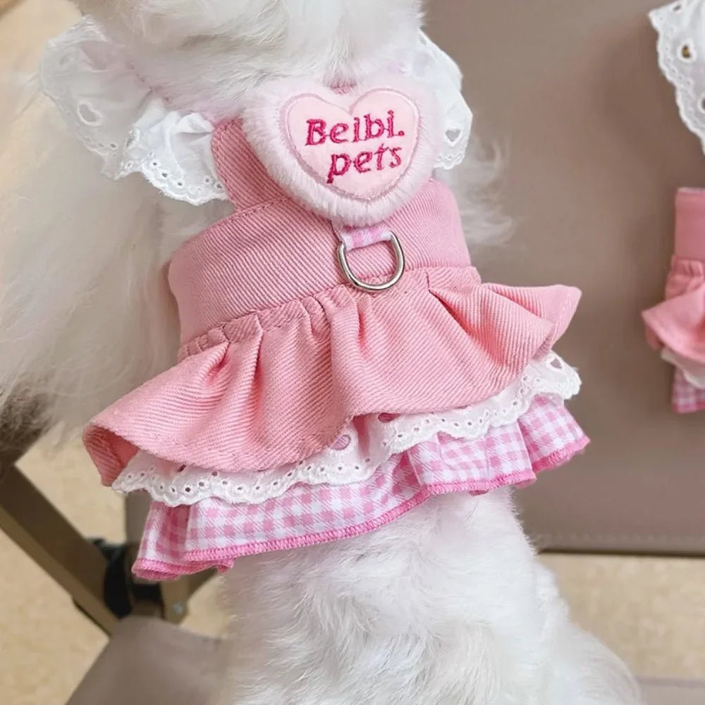 Comfortable pink dog harness with front and back leash attachments, ideal for all pets.
