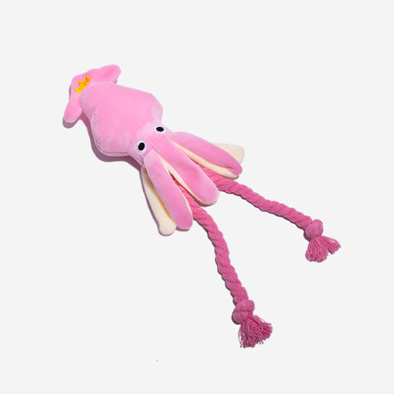 Pink squeaky squid plush dog toy for interactive playtime, stimulating dental health and cuddles