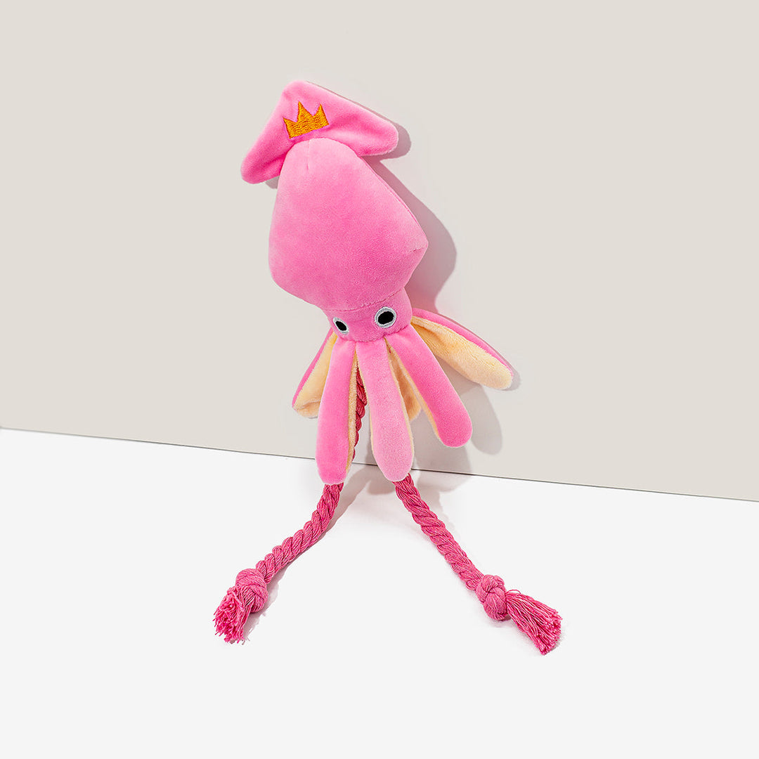 Soft pink squid dog toy with squeaker, perfect for pets' playtime, entertainment, and comfort