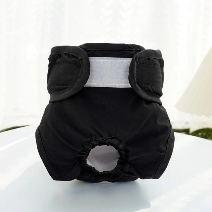 Pink washable female dog diaper with adjustable straps, for pet incontinence and hygiene