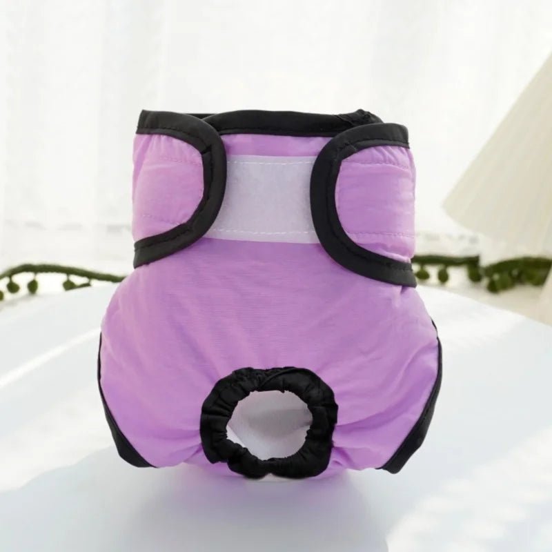 Packaging of a washable female pet diaper, emphasizing its eco-friendly and reusable features