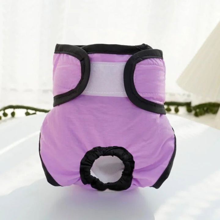 Packaging of a washable female pet diaper, emphasizing its eco-friendly and reusable features