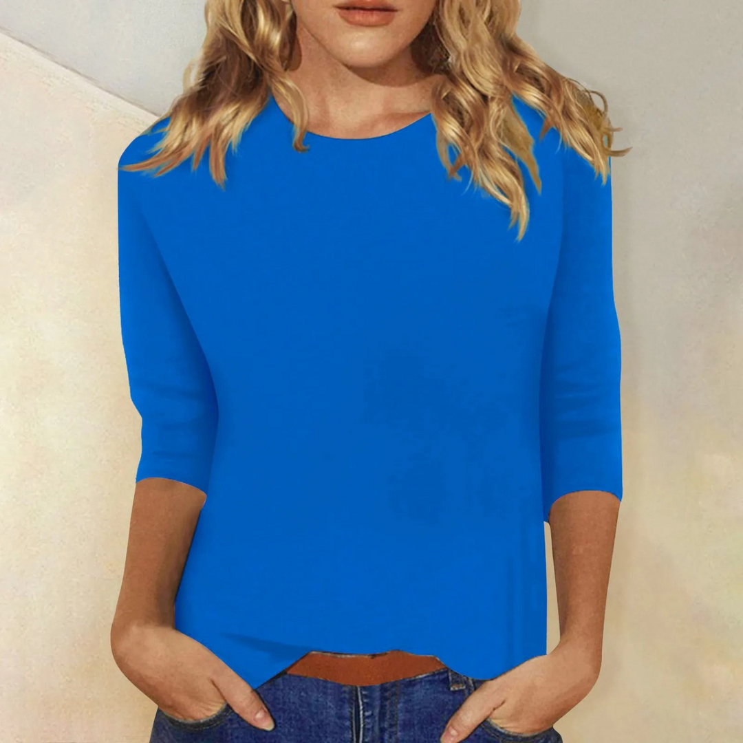 Black women's casual 3/4 sleeve round neck top with relaxed fit. Comfortable, versatile, & an everyday staple.