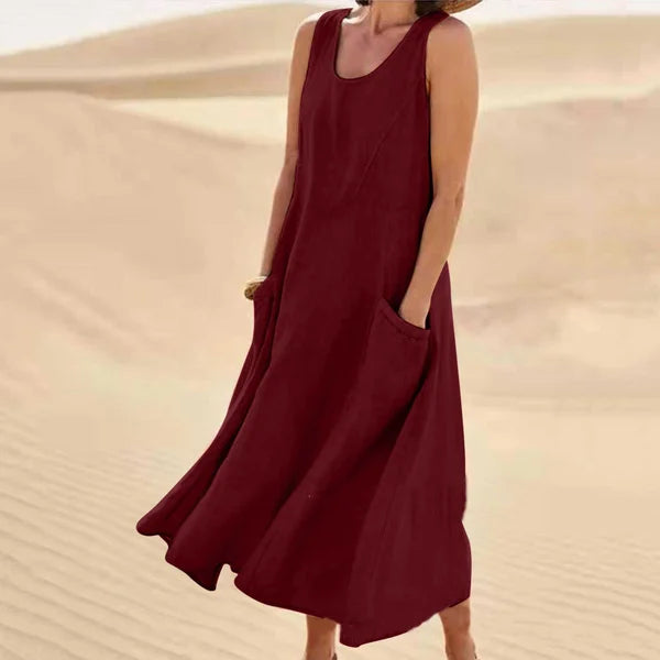 Pink spring-summer women's dress, flowy and comfortable for various occasions.