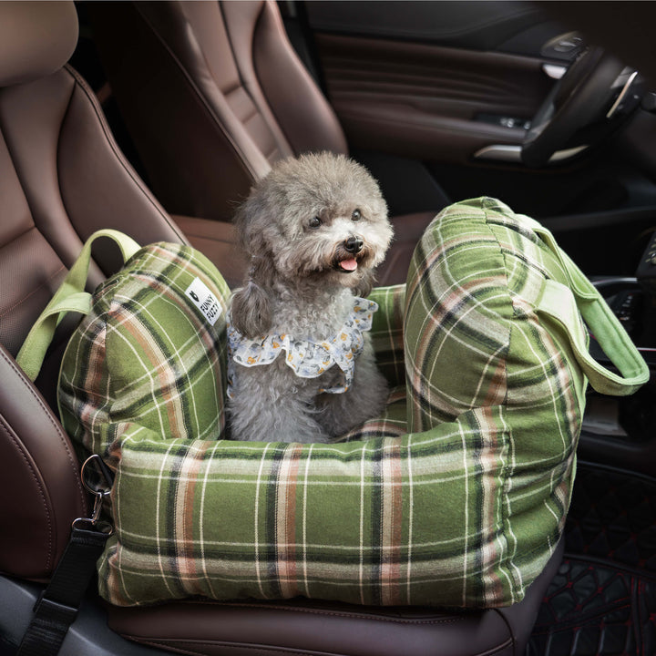 Pet travel bed for safety: plaid car seat for small dogs, essential dog accessories.