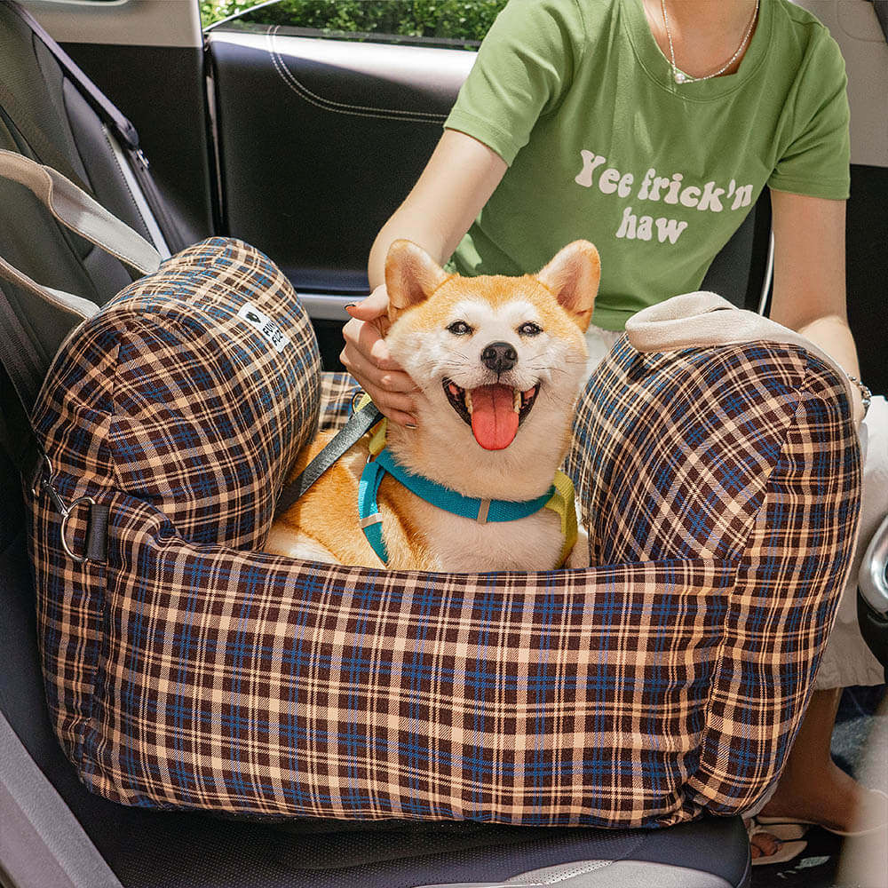 Dog car seat bed in plaid for small dogs, a washable and comfortable pet travel solution.