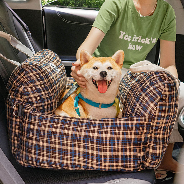 Dog car seat bed in plaid for small dogs, a washable and comfortable pet travel solution.