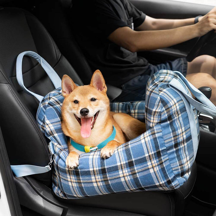 Safety car seat bed for small dogs: plaid design, perfect for vehicle pet travel.