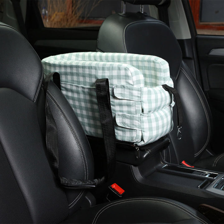 Small dog car seat with a cozy plaid pattern, ideal for safe and stress-free pet travel.