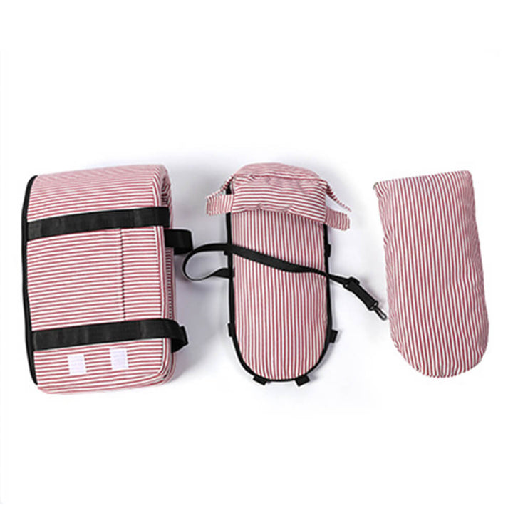 Travel console pet seat, designed for small dogs and cats, with safety straps.