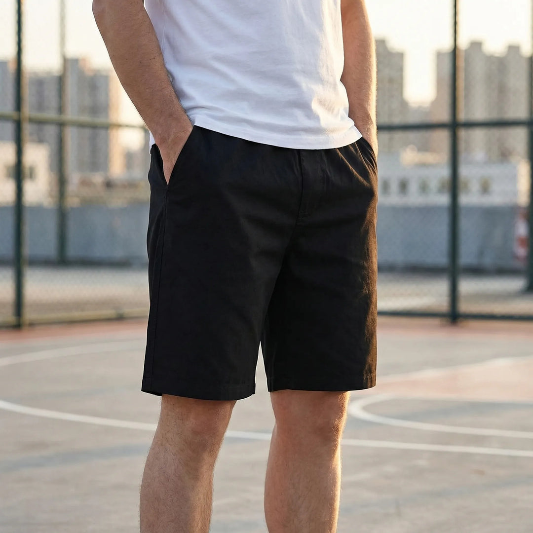 Plus size men's casual streetwear shorts, knee-length, relaxed fit, elastic waist for summer comfort.