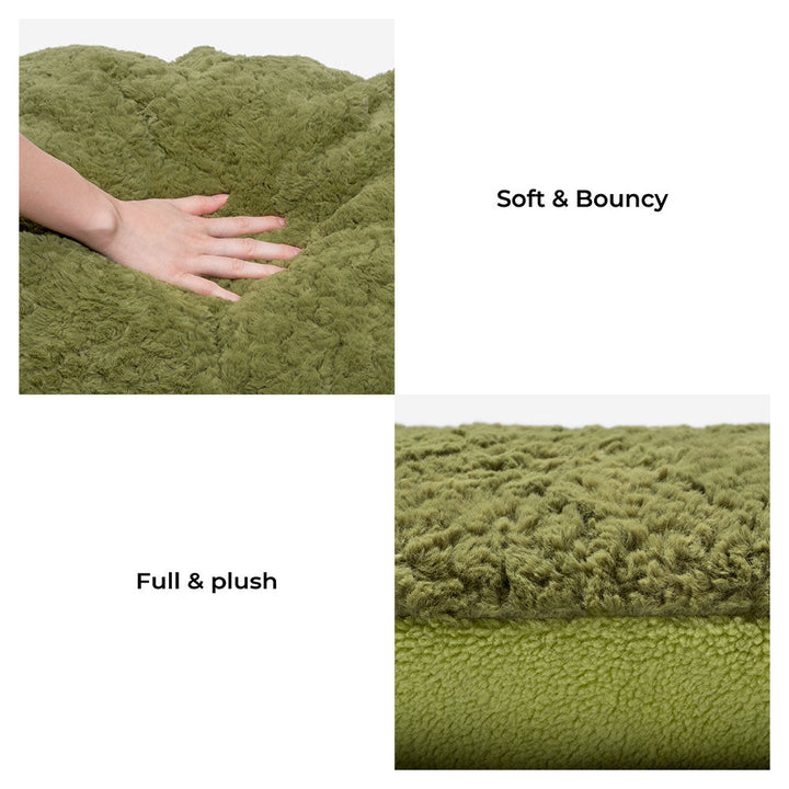 Dog sleeping soundly in a cozy, soft fleece pet bed with removable cover