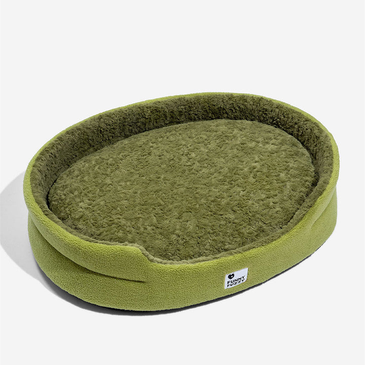 Top view of a round, comfortable dog bed with thick plush walls and removable cover