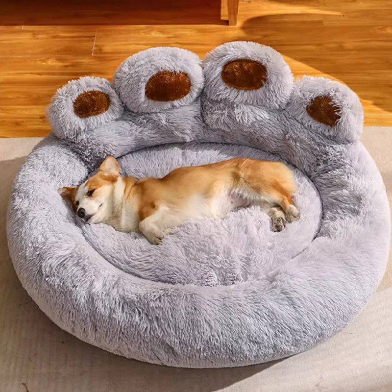 Plush bear paw orthopedic pet bed in grey, offering calming support for dogs & cats.