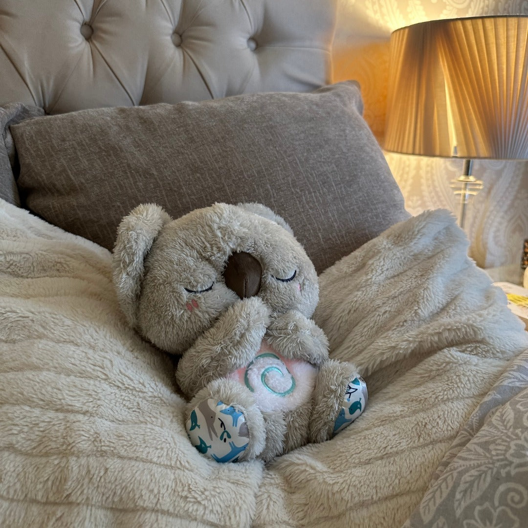Soft, plush calming koala toy, designed for soothing comfort and stress relief with gentle breathing motion.