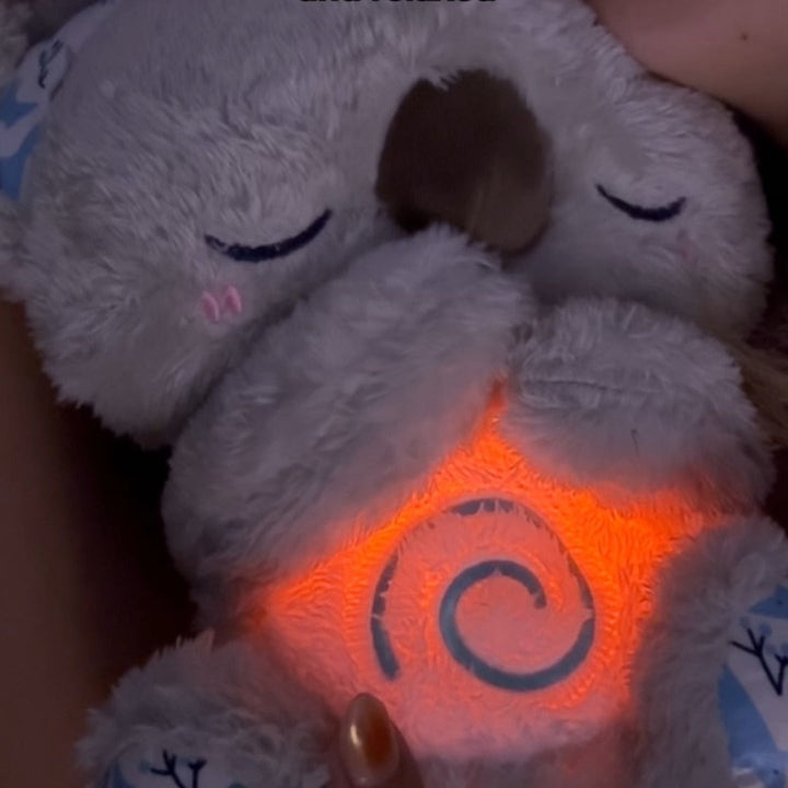 Gentle koala breathing toy offering stress & anxiety relief, a comforting plush companion for relaxation and better sleep.
