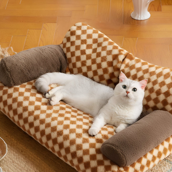 Washable cat bolster bed in a cozy sofa design, perfect pet furniture for cats.