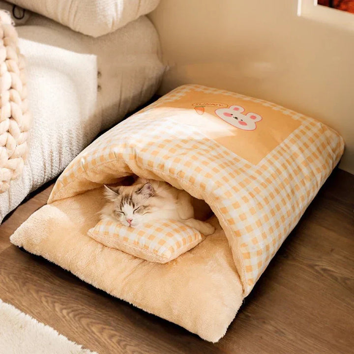 Snug cat sleeping bag bed, offering cozy comfort for pets.