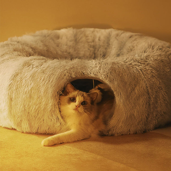 Plush cat tunnel bed for play and rest, a cozy pet accessory hideaway for cats.