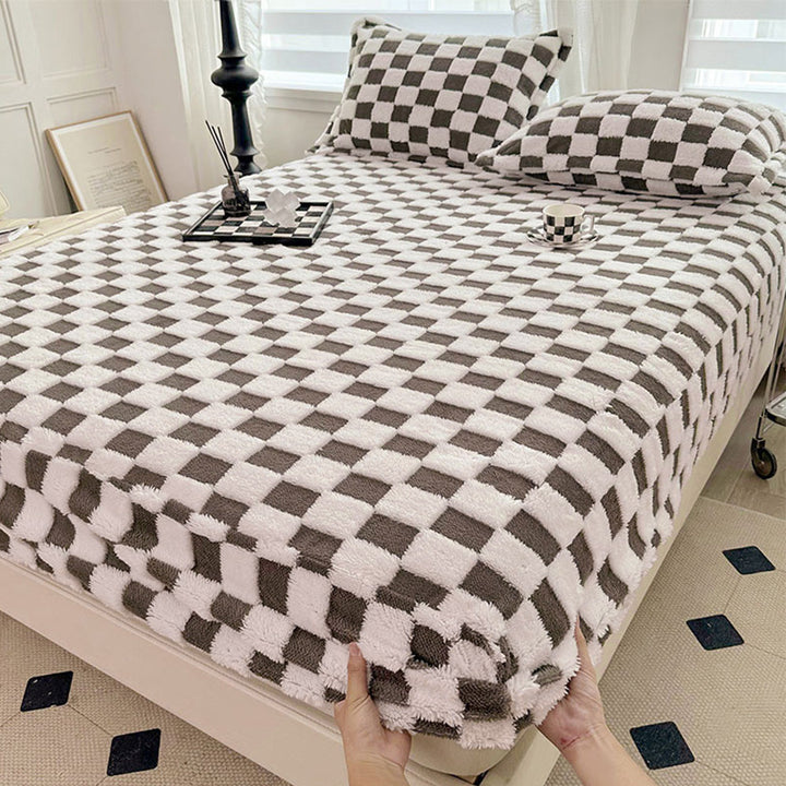 Soft milk velvet fitted sheet featuring a modern checkerboard design, luxurious and warm home decor bedding