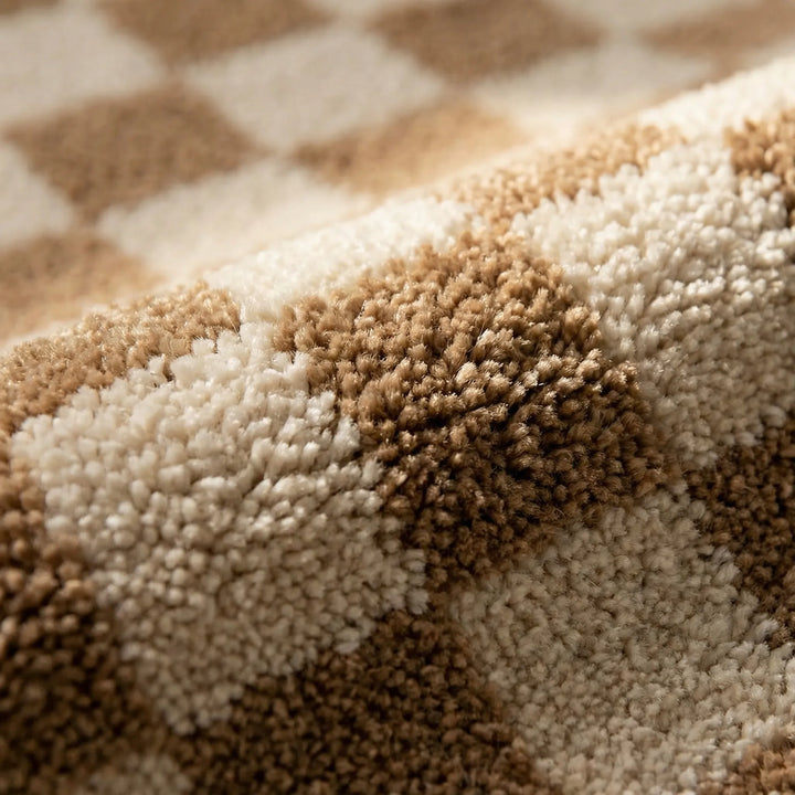 Non-slip, quick-dry plush checkered bath mat for ultimate comfort and safety in your bathroom.