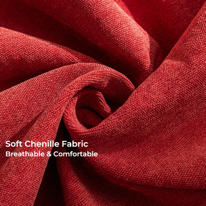 Full view of a modular sofa covered with a textured chenille slipcover for protection