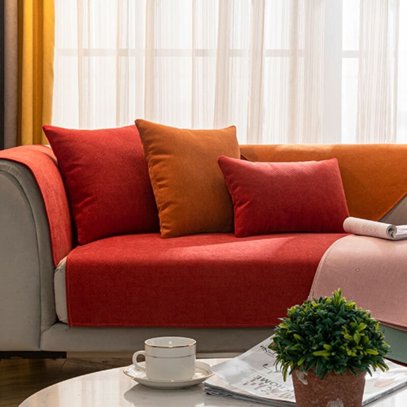 Pet-friendly chenille sofa cover snugly fitted on a three-seater, ensuring furniture longevity
