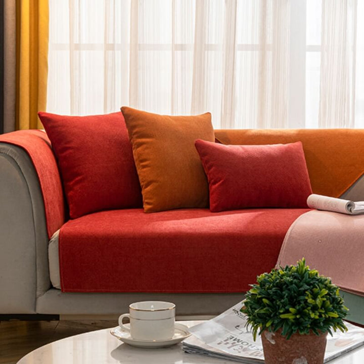 Pet-friendly chenille sofa cover snugly fitted on a three-seater, ensuring furniture longevity
