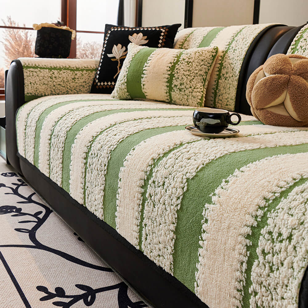 Detail of the thick, plush chenille fabric with a striped pattern, used in a durable sofa cushion cover.
