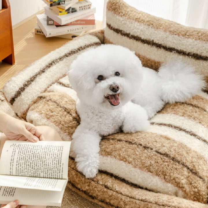 Warm winter pet bed, plush grey sofa design for ultimate dog comfort.