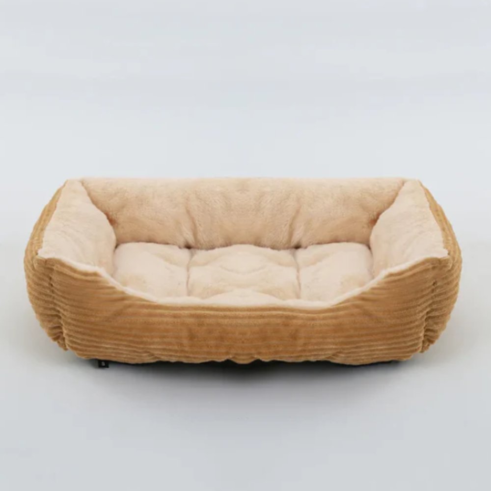 Ultra-soft plush dog bed, ideal for puppies and adult dogs. Easy to clean and perfect for snuggling.