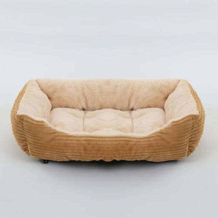 Ultra-soft plush dog bed, ideal for puppies and adult dogs. Easy to clean and perfect for snuggling.